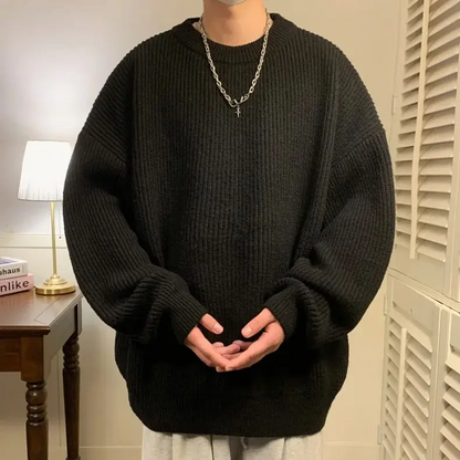 Oversized men's ribbed sweater, comfortable and versatile for a relaxed casual top.