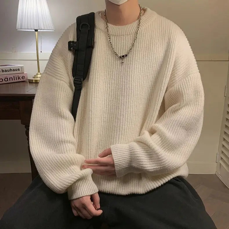 Stylish men's ribbed pullover with dropped shoulders, an ideal layering piece for modern fashion.
