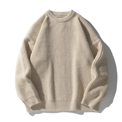 Close-up of the ribbed texture on a men's relaxed fit pullover sweater, showcasing quality.