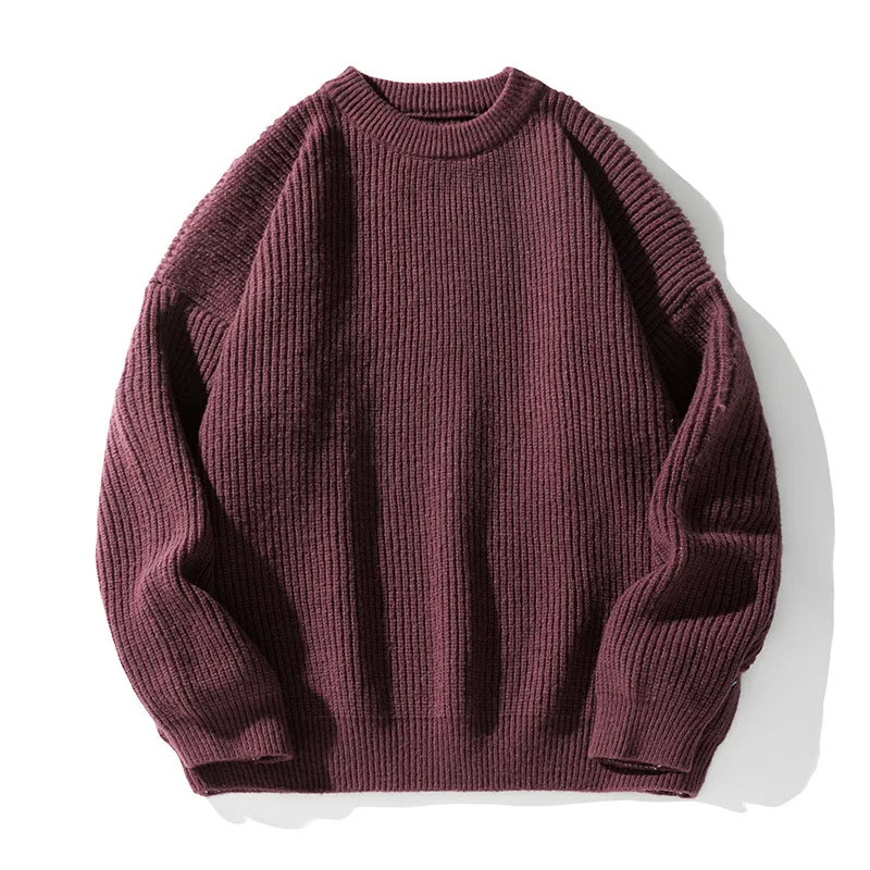 Men's modern ribbed sweater in a relaxed fit, a stylish and comfortable layering piece.