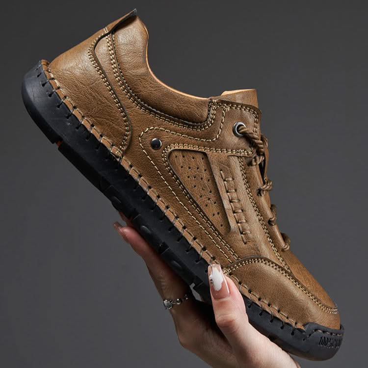 Pair of men's rugged brown hiking shoes, ready for any all-terrain adventure and comfortable walking.
