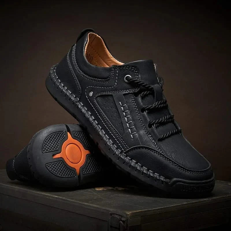 Black men's rugged walking shoes, designed for comfortable trekking and all-terrain outdoor adventures.