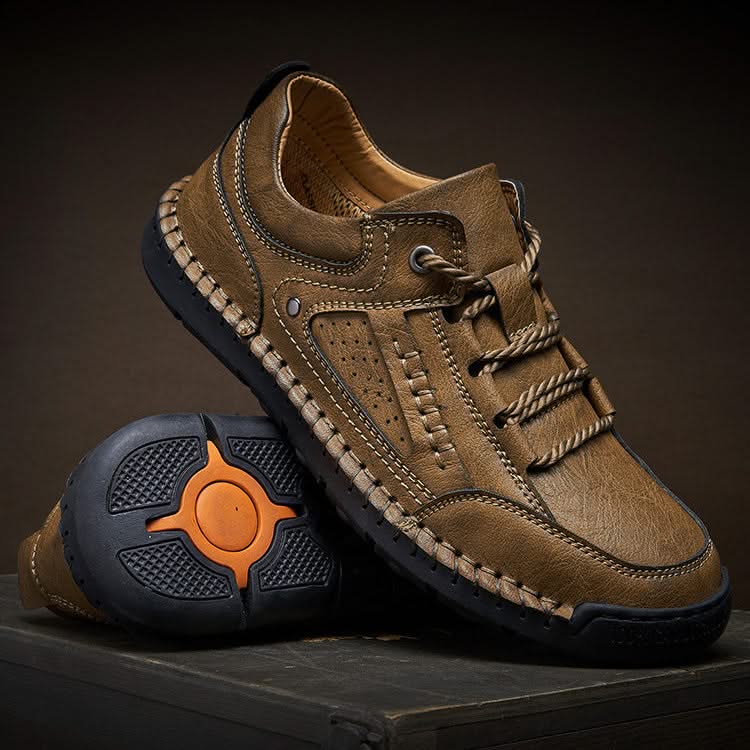 Side profile of men's rugged hiking shoes in black, showcasing durable design for outdoor trekking.