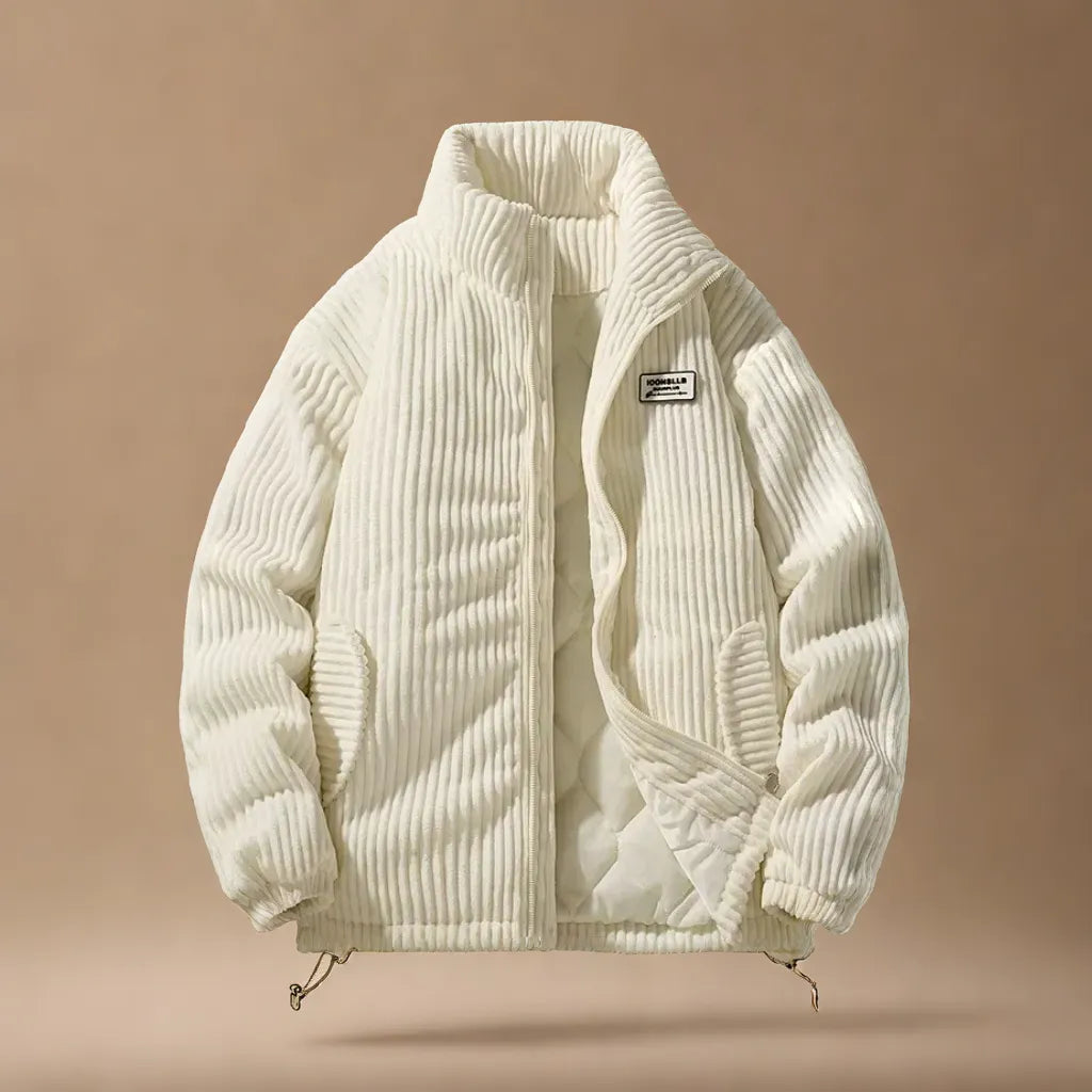 Detail of rugged men's alpine jacket's pocket & zipper. Functional, stylish long-sleeve outerwear for fall/winter.