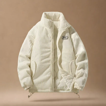 Detail of rugged men's alpine jacket's pocket & zipper. Functional, stylish long-sleeve outerwear for fall/winter.