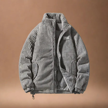 Modern men's rugged alpine jacket, a stylish long-sleeve collared outerwear piece for versatile year-round fashion.