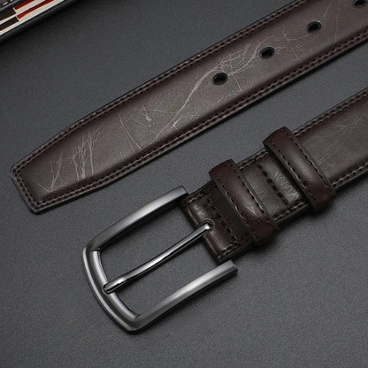 Close-up of a men's rugged cowhide leather belt, highlighting the durable gunmetal buckle and natural texture.