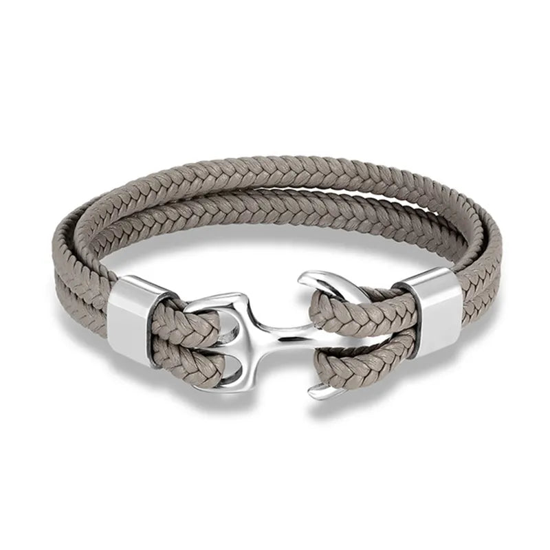Men's nautical style leather bracelet with a striking stainless steel anchor, masculine wrist accessory.