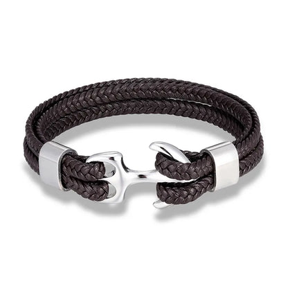 Black leather men's anchor bracelet, sleek stainless steel, adds a nautical touch to any outfit.