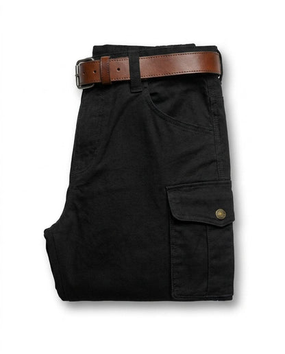 Functional cargo pockets on rugged men's leather pants, ideal for workwear, outdoor & utility.