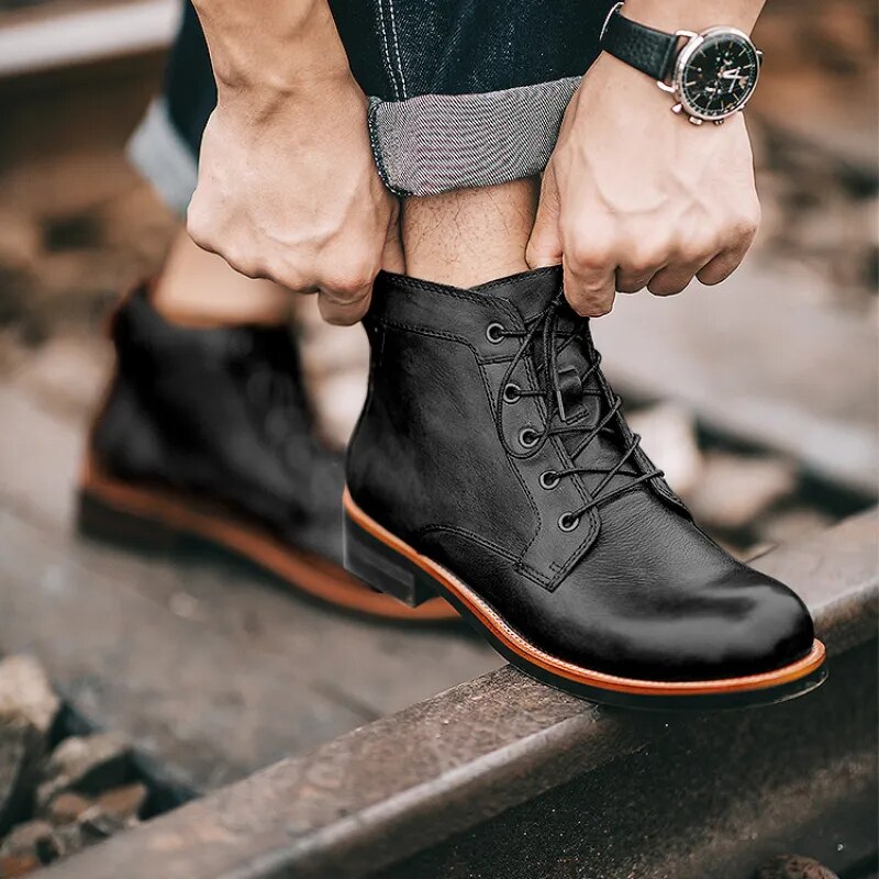 Stylish Men's black lace-up boots, rugged yet comfortable for everyday wear. Durable Odyssey footwear for men's fashion.