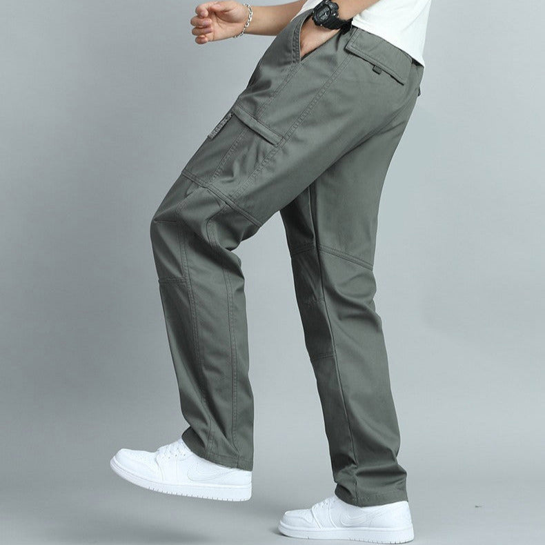 Relaxed fit leg opening of versatile men's outdoor cargo pants, comfortable for active use.