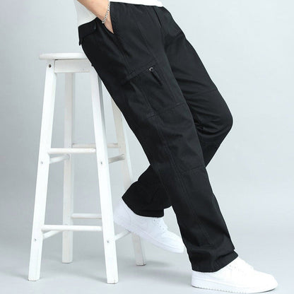 Close-up of durable multi-pockets on men's rugged cargo pants, perfect for storing essentials.