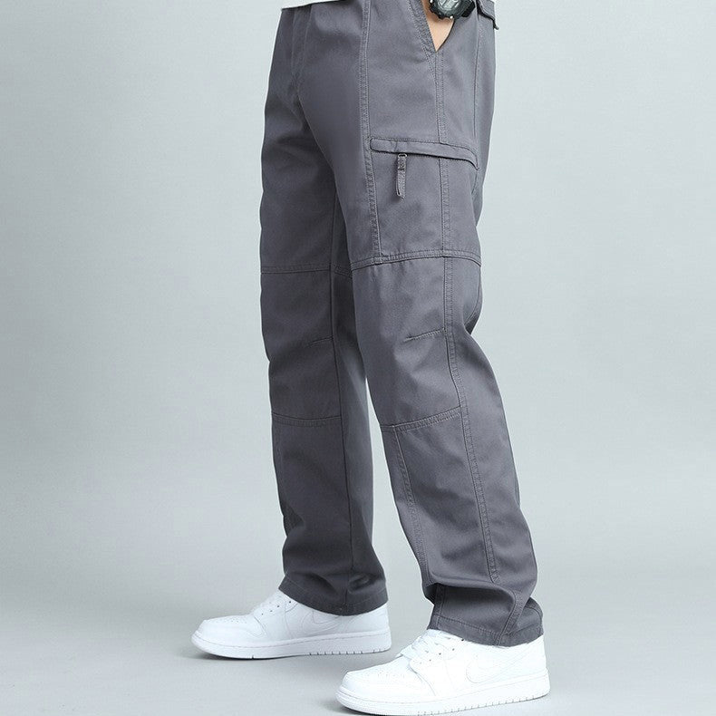 Man hiking in rugged outdoor cargo pants, showing practical multi-pockets and comfortable fit.