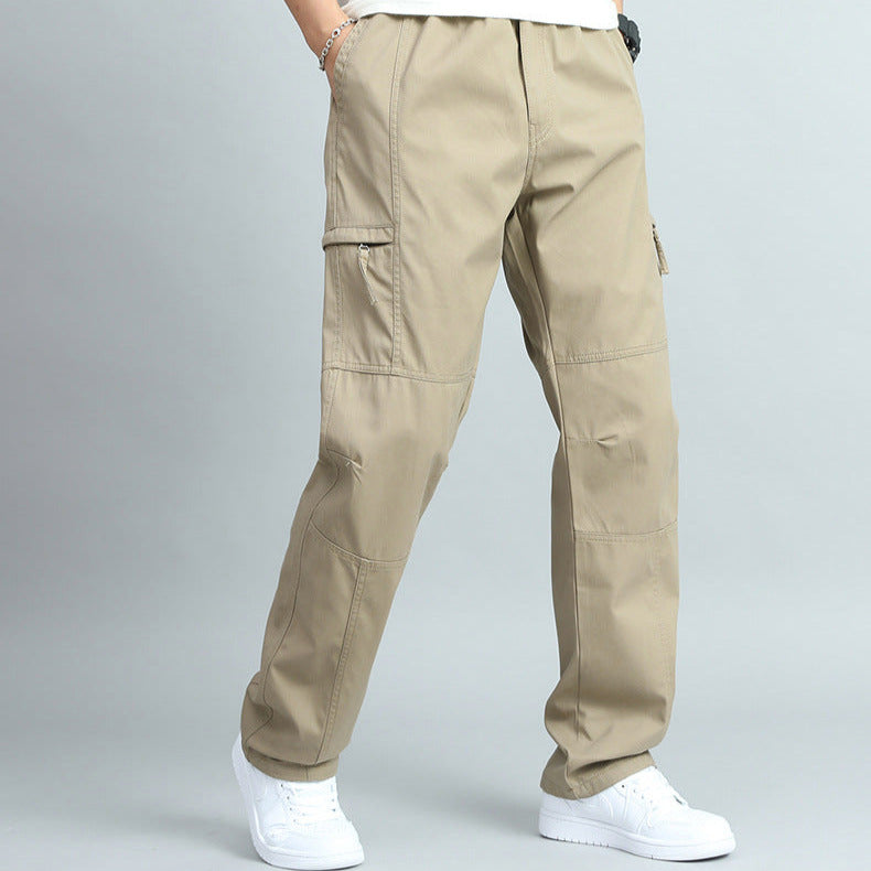 Adjustable waistband and sturdy belt loops on men's durable outdoor cargo pants, ready for workwear.