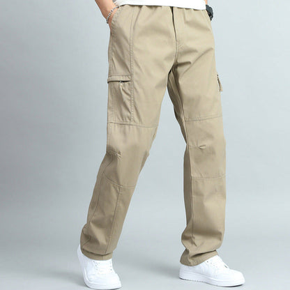 Adjustable waistband and sturdy belt loops on men's durable outdoor cargo pants, ready for workwear.