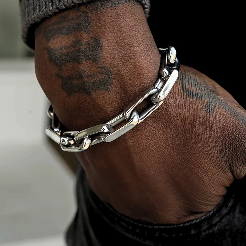 Men's rugged stainless steel chain bracelet. Bold metal link design, perfect for a masculine fashion statement.
