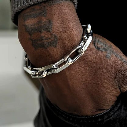 Men's rugged stainless steel chain bracelet. Bold metal link design, perfect for a masculine fashion statement.