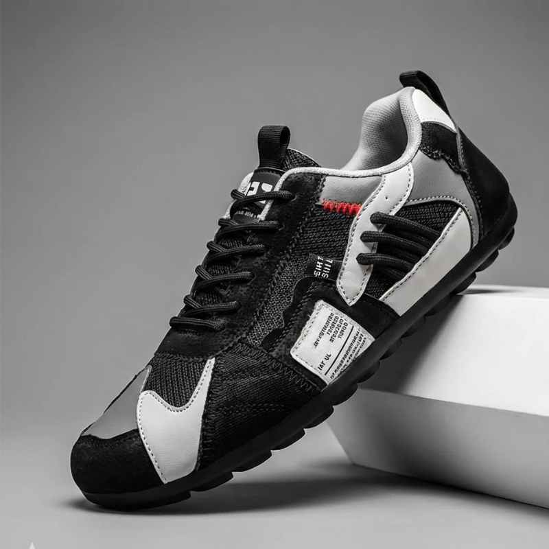 Stylish mens footwear, combining athletic comfort with essential utility shoe features.