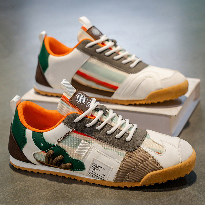 Durable men's adventure sneakers, versatile for both urban and light outdoor use.