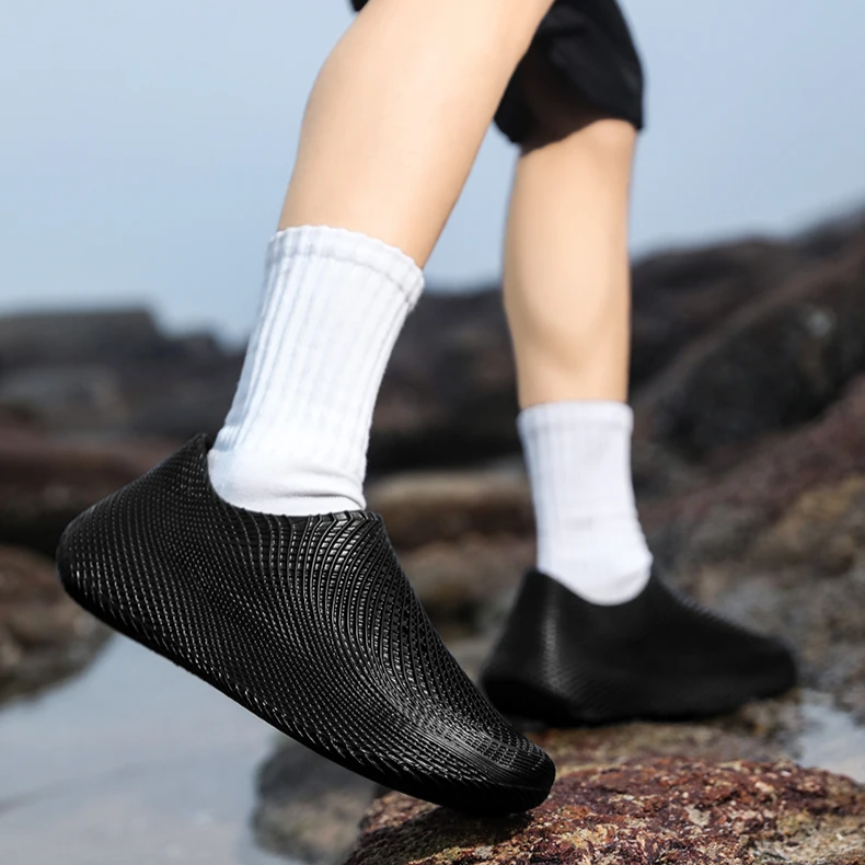 Side view of men's seamless all-terrain running shoes; water-resistant, durable for trails & running.