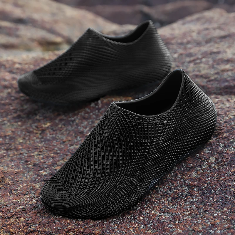 Rugged sole of men's all-terrain running shoes, providing grip for trails, outdoor adventure & athletic running.