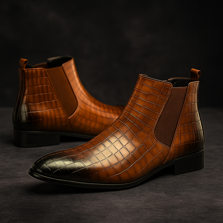 Detailed view of men's Sevilla alligator Chelsea boots. Textured genuine alligator leather, slip-on design.
