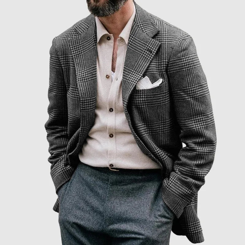 Stylish men's tailored checkered blazer, perfect for formal wear or smart casual occasions. Sharp men's fashion.