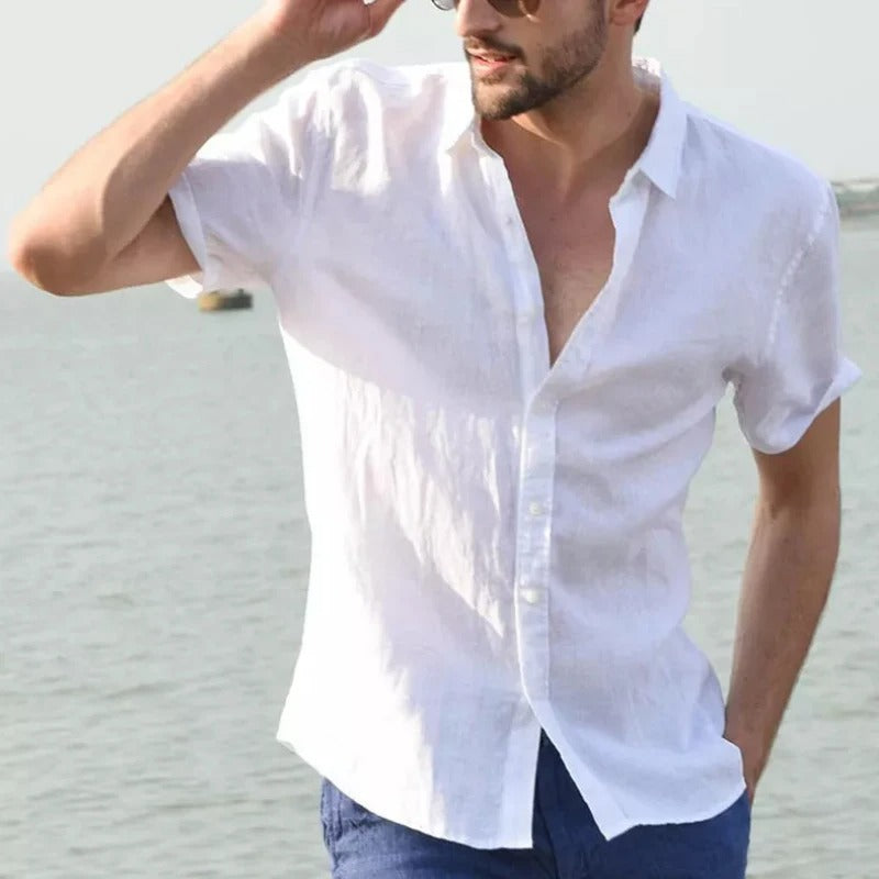 Breathable short sleeve men's linen shirt, relaxed fit, essential for comfortable summer fashion.