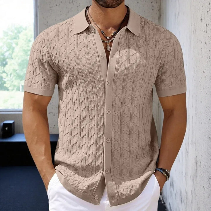 Black men's versatile polo shirt with a smart textured button-down collar, great for any occasion.
