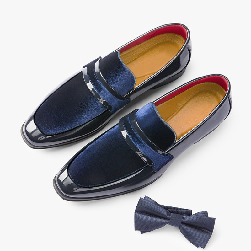 Close-up of elegant men's dress loafers, showcasing sleek design and polished finish for formal wear.