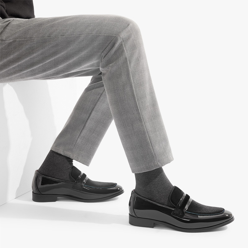 Navy blue men's sleek loafers, ideal dress shoes for formal gatherings & classy event attire.