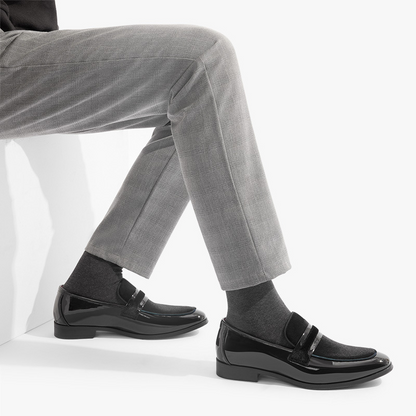Navy blue men's sleek loafers, ideal dress shoes for formal gatherings & classy event attire.