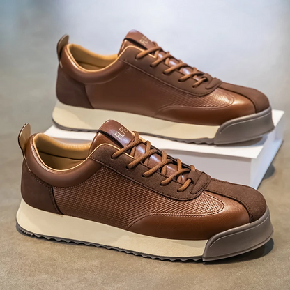 Comfortable men's black sneakers with a sleek design for daily use.