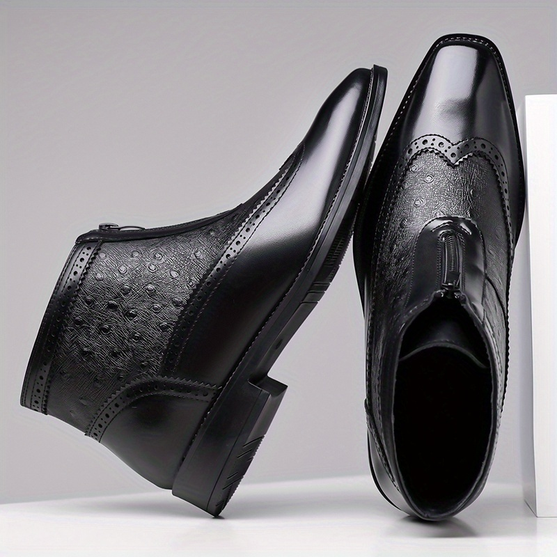Stylish men's brown ankle boots, front zip closure for sleek modern look.