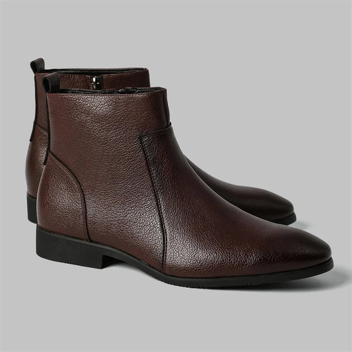 Modern men's fashion boots: sleek ankle fit, convenient side zip, sharp pointed toe.