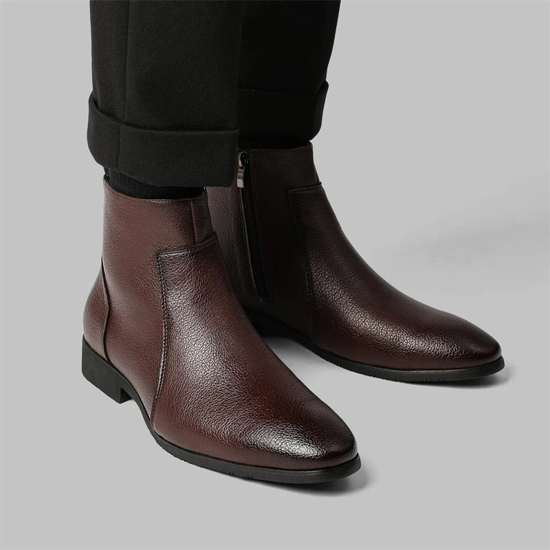 Men's dress boots: elegant side zip ankle design, pointed toe, professional look.