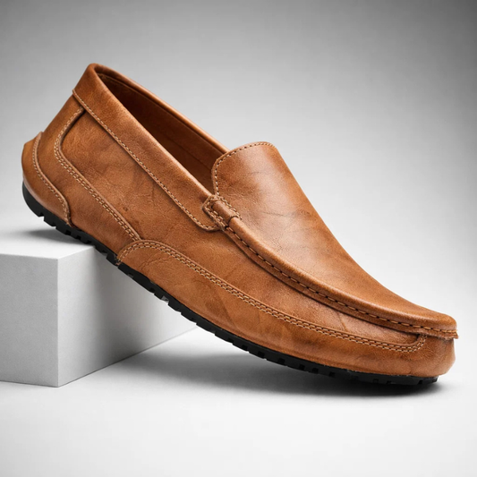 Men's sleek brown leather comfort loafers. Stylish slip-on everyday footwear for casual or dressy occasions.