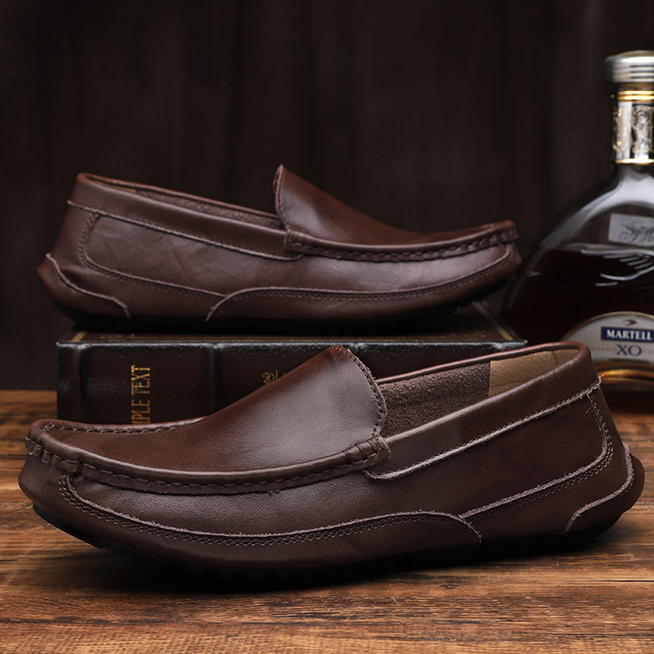 Rich brown men's comfort loafers. Sleek leather slip-on shoes for stylish everyday casual and dress wear.