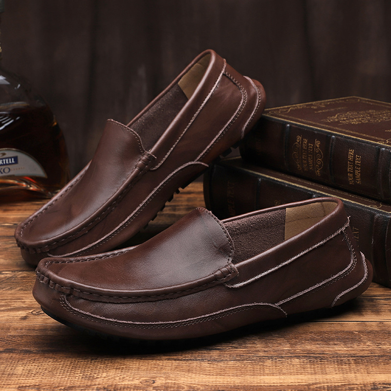 Classic black men's comfort loafers. Sleek leather slip-on shoes for stylish everyday casual and dress wear.
