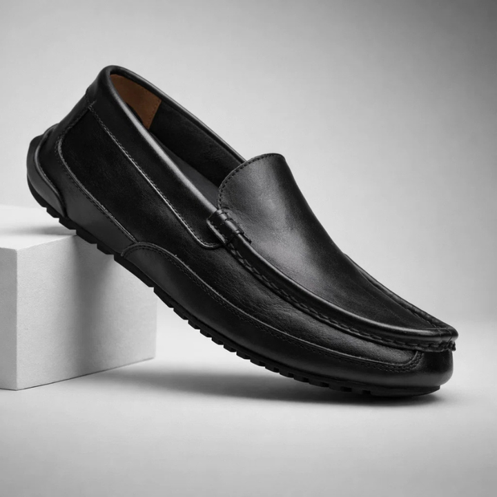 Easy slip-on men's comfort loafers in sleek brown leather, perfect everyday footwear for quick style.