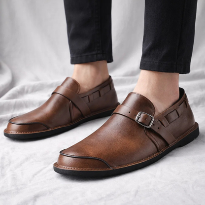 Stylish men's dress loafers with a refined buckle detail. Perfect for a polished, versatile fashion statement. Comfort footwear.
