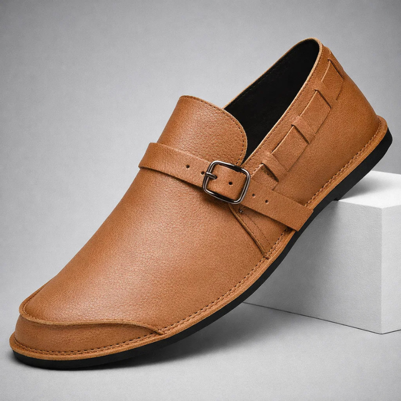 Elegant casual men's loafers, easy slip-on comfort for everyday wear. Versatile sleek design with buckle detail.