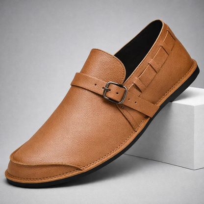 Elegant casual men's loafers, easy slip-on comfort for everyday wear. Versatile sleek design with buckle detail.