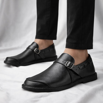 Men's sleek comfort loafers on a foot, emphasizing elegant slip-on style for polished everyday fashion. Versatile shoes.