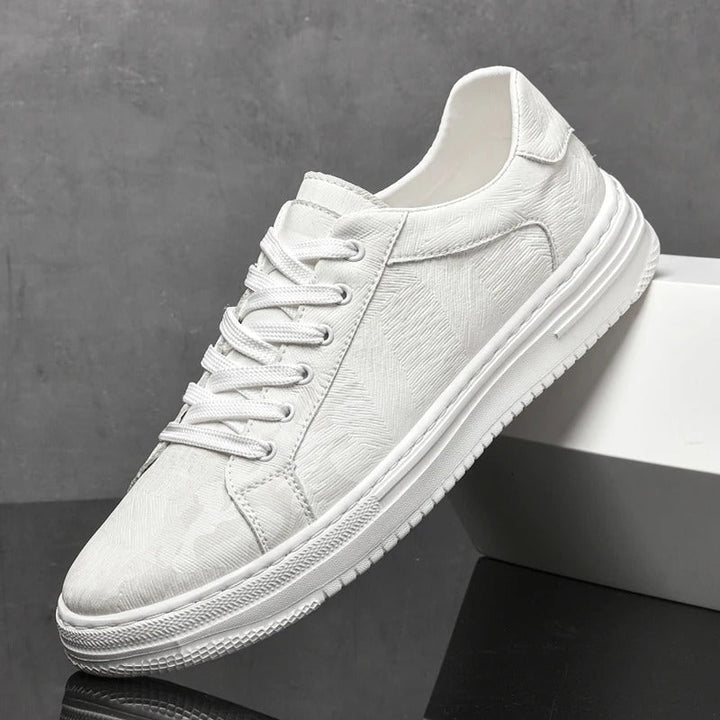 White men's sleek everyday sneakers, versatile & comfortable low-top casual footwear.