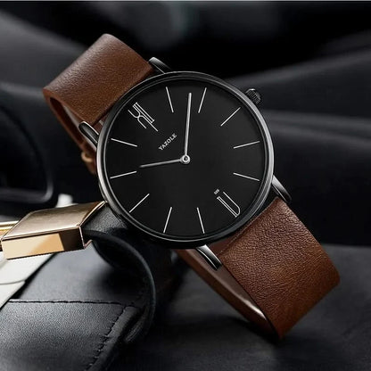 Men's sleek minimalist dress watch, black leather strap & polished stainless steel case.