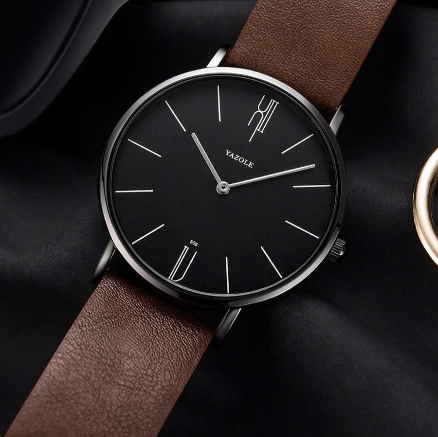 Elegant men's minimalist timepiece. Classic design with genuine leather strap, perfect for dress or everyday.