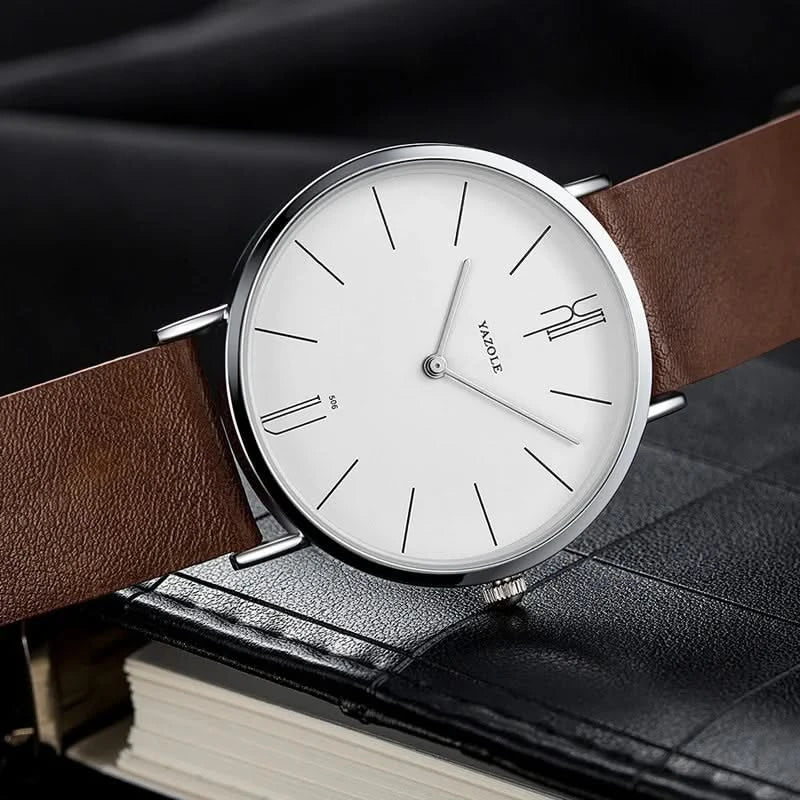 Stainless steel men's dress watch with a sleek minimalist dial & high-quality leather strap.