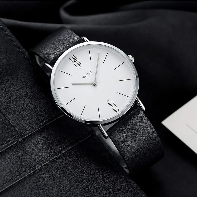 Classic men's dress watch, minimalist dial, smooth black leather strap, polished stainless steel.